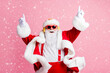 © deagreez - Photo of crazy funky santa claus enjoy listen x-mas christmas fairy jolly radio headphones raise fingers wear headwear sunglass suspenders isolated over pastel color background