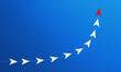 © P.BRICOFA - Red paper airplane leading white planes on a blue background