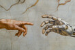 © Magryt - A cyborg finger touching a human finger, modern remake of The Creation of Adam. Technology meets humanity, biology vs technology. Machine learning, AI progress, big data, digital Interface