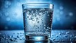 © sasiprapa - Close-up macro shot of a refreshing glass of water with bubbles and condensation