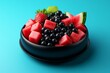 © Thanyarat - A 3D-illustrated bowl of grapes, strawberry slices, and watermelon cubes in vibrant, playful colors and exaggerated textures
