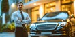 © Ah Pich  - A valet parking service with an attendant standing by a luxury car and ready to assist.