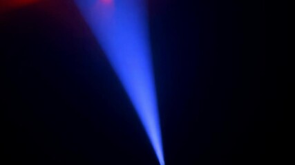 Wall Mural - blue spotlight beam on black background
