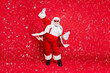 © deagreez - Full length size photo of carefree delightful rejoicing funky holly-jolly moving st nicholas father christmas big belly in suspenders traditional outfit fur trousers sunglass boots isolated background