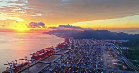 Aufkleber - Aerial shot of large cargo container terminal at seaside at sunset