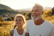 © Milos - A joyful gray-bearded man and a laughing young girl share a beautiful moment together while exploring a sunlit field under the afternoon sky.