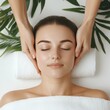 © PuiZera - A serene spa treatment with a woman receiving a facial massage.
