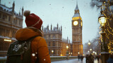 Fototapeta Big Ben - Person in Warm Winter Attire Standing Before Snowy Big Ben in London