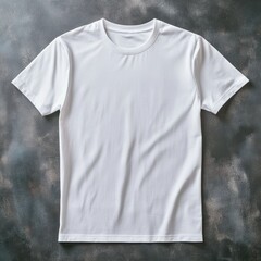 Plain white t-shirt laid flat on a textured background.