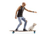 © Ljupco Smokovski - Bald man with a dog riding a longboard