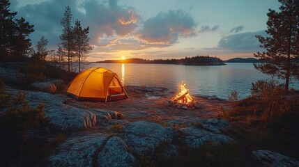Poster - A bright yellow tent sits near a tranquil lake as the sun sets on the horizon. Soft flames flicker from a campfire, enhancing the peaceful wilderness experience.