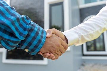 Wall Mural - lease, rental and selling home. Dealership manager smile handshake to the new homeowner. rent house, Sales, loan credit financial, insurance, Seller, dealer, installment