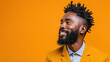 © ChimE - Bright and cheerful portrait of a joyful afro guy against a vibrant orange backdrop, exuding warmth and positivity.