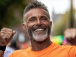 © Suplim - Joyful Mature Man in Orange Shirt
