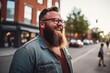 © Inigo - Portrait of a handsome bearded hipster man with glasses in the city