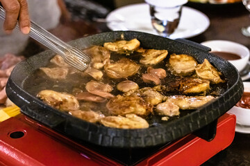 Close up of Beef steak frying in restaurant.