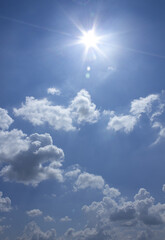 Wall Mural - 
Blue sky with clouds and sun
