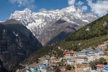 Wall Mural - Namche Bazar village in Khumbu region of Nepal with Mt.Kongde Ri in the background.