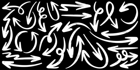 Wall Mural - set of hand drawn vector arrows doodle on black background.