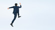 © metamorworks - ジャンプする若い男性ビジネスパーソンの後ろ姿の全身写真（切り抜き背景透過PNGも販売しております。作成者リンクから「PNG」で検索してください）