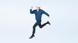 © metamorworks - ジャンプする男性作業員の全身写真（切り抜き背景透過PNGも販売しております。作成者リンクから「PNG」で検索してください）