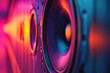 © Vovmar - Close-up of loudspeaker speaker on neon background. Acoustic systems for audio music concerts. Sound and vibration