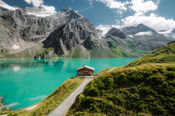Wall Mural - beautiful alpine mountain scenery with traditional wooden mountain hut at mooserboden high-mountain 