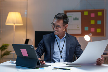 Businessman working in the office, calculating, thinking, processing, financial accounting. financial documents Company progress and financial and tax growth management systems in the office.