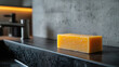 © SashaMagic - Bar of soap on a modern bathroom countertop.