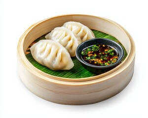 Steamed Dumplings with Dipping Sauce in Bamboo Basket