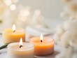 © LoFi J. - Close up of aromatherapy candles with a blurred background.