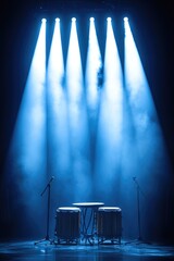 Three drum sets and three microphones on a concert stage