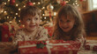 © Gianandrea Villa - Children in pajamas excitedly unwrapping gifts under the Christmas tree on Christmas morning. The room is decorated festively with ornaments, stockings, and holiday lights