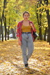 © Ольга Калинчук - Girl walking in autumn park