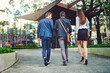 © peopleimages.com - Business people, back view or walking in city with colleagues in street for partnership, collaboration or teamwork. Real estate agents, realtors or outdoor buildings for travel, commute or project