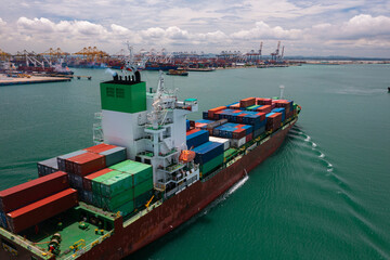 Cargo Ship Entering Busy Container Port