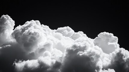 Aufkleber - White clouds contrast sharply against a black background showcasing their natural beauty