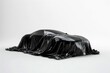 © dony - presentation car under black cloth on white background. 3d rendering