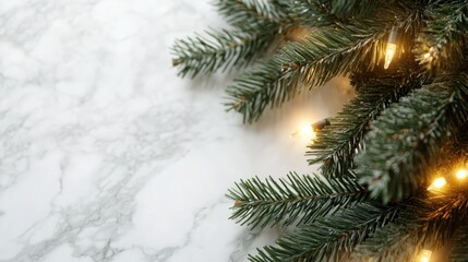Poster - Christmas tree branches with bokeh blurred fairy lights set against a marble background