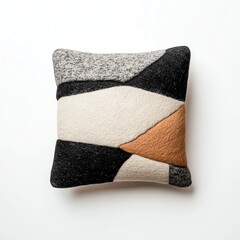 Decorative pillow with abstract geometric design on a white background.