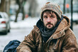 © Di Studio - dirty homeless man sitting on the street with copy space