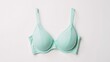 © Pixel Matrix - Isolated image featuring minimalistic mint-colored bra with lace detailing on a pure white background