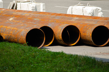 Large metal pipes on the road