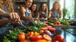 © Yalexai - Group of friends preparing fresh vegetables in kitchen together