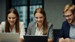 © claudunia - Business team working with laptops and phones