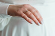 © Galka3250 - Elegant Bridal Hand with Sparkling Ring and Manicured Nails