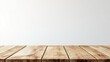 © arthit - Rustic wooden table with blank wall background