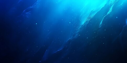 Wall Mural - abstract blue and turquoise background with soft, blurred light and sparkles.