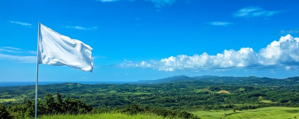 Scenic landscape with white flag and blue sky, panoramic view. Peaceful concept