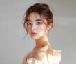 © NoonBusin - Studio shot of a Beautiful Asian idol girl with healthy skin looking at the camera. Natural makeup of a beautiful model with copy space. Cosmetic concept.